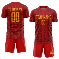 Maillot de football rouge personnalisé à sublimation uniforme doré